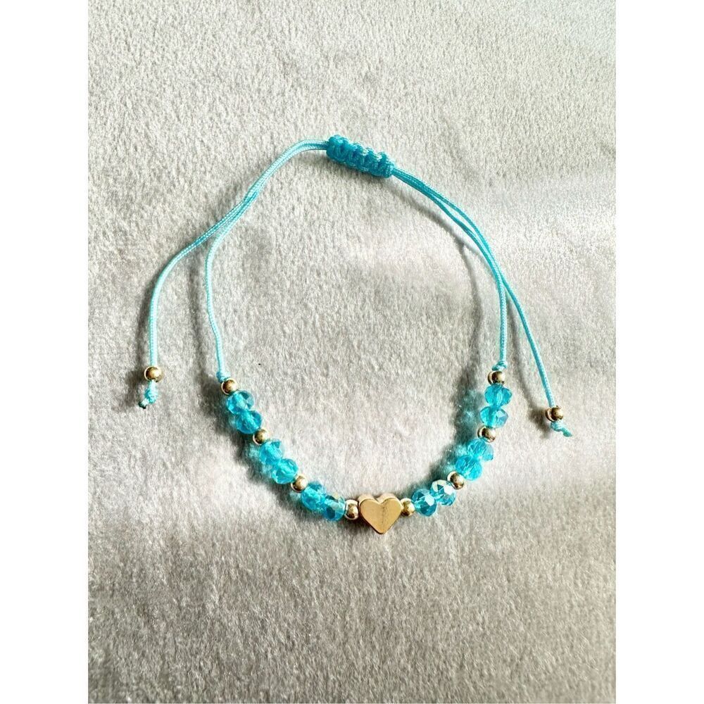 Bright blue sparkly beaded gold heart friendship bracelet ￼